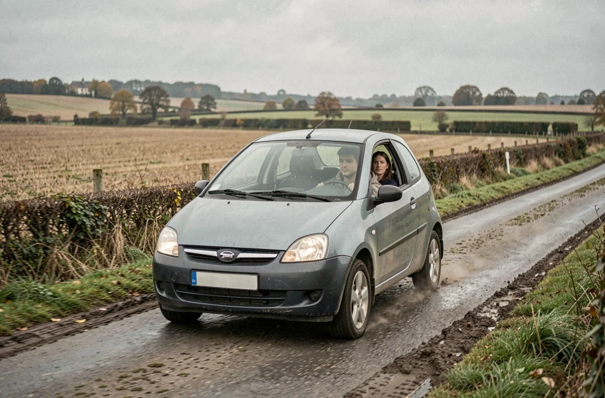 Jeune conducteur en formation sur une route rurale près d'Aillant-sur-Tholon avec un moniteur de l'auto-école AES